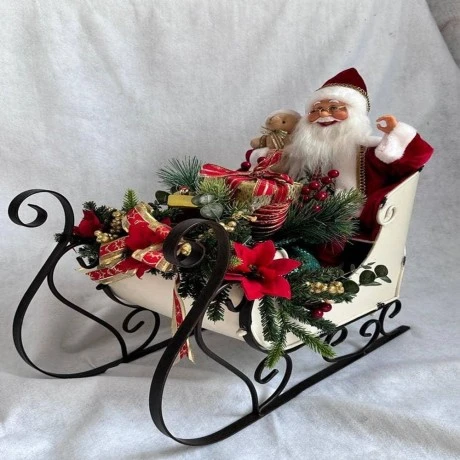 XMAS CREAM METAL SLEIGH WITH SANTA AND CHRISTMAS ARRANGEMENT 95X50X85CM