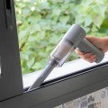 Rechargeable wireless mini vacuum cleaner gray color 16.5x16x5.5cm.