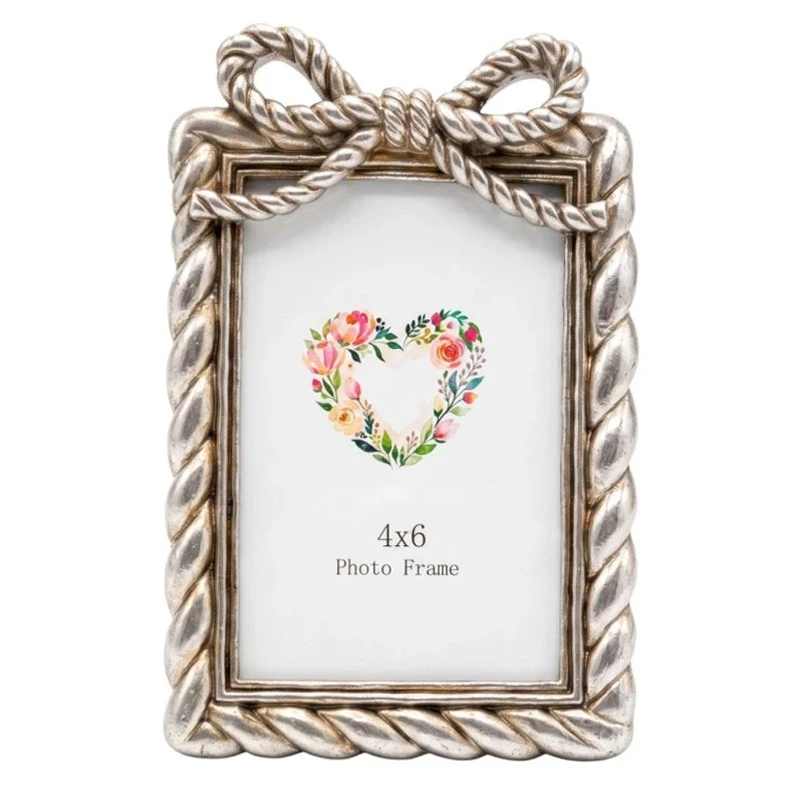 SILVER RESIN PHOTO FRAME WITH TWISTED ROPE AND BOW 10X15CM