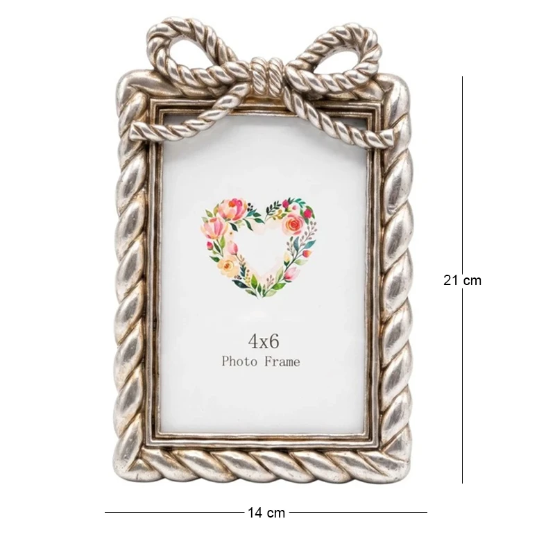 SILVER RESIN PHOTO FRAME WITH TWISTED ROPE AND BOW 10X15CM