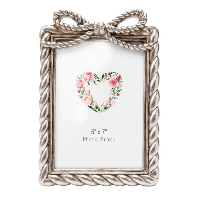 SILVER RESIN PHOTO FRAME WITH TWISTED ROPE AND BOW 13X18CM