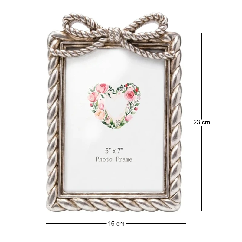 SILVER RESIN PHOTO FRAME WITH TWISTED ROPE AND BOW 13X18CM