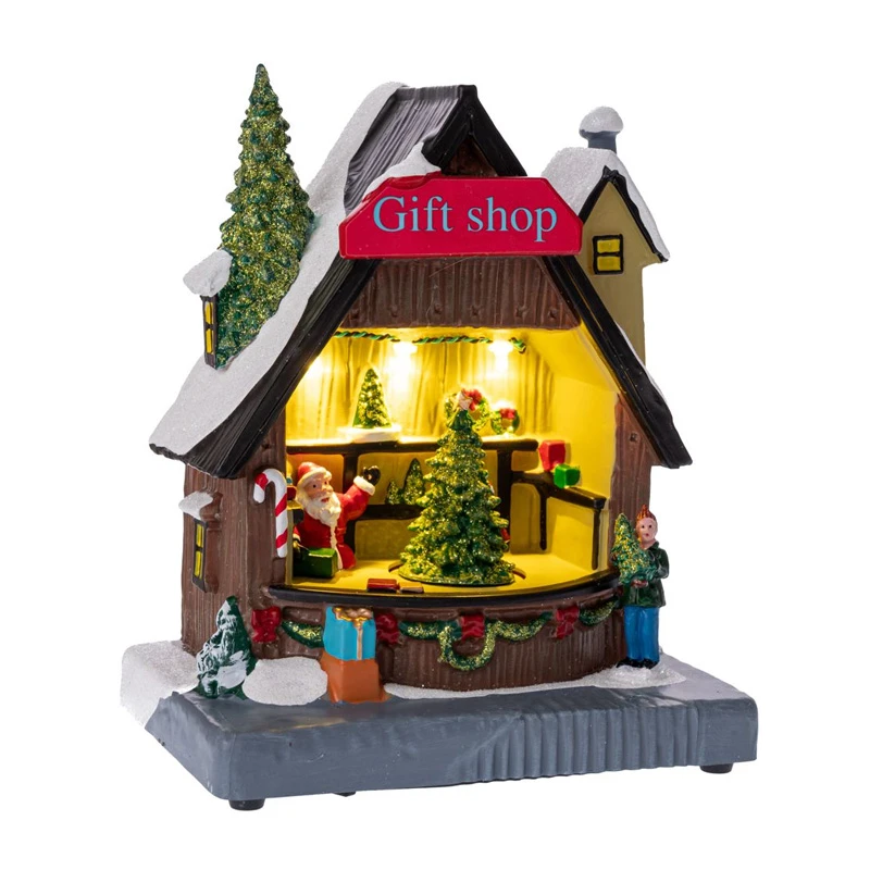CHRISTMAS RESIN GIFT SHOP WITH ADAPTOR LIGHTS AND MOVEMENT 18X7Χ14CM