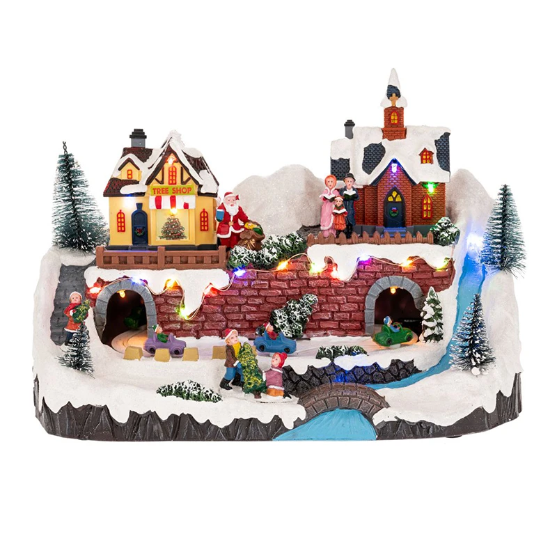 XMAS LIGHTED VILLAGE WITH MOVEMENT INCLUDING ADAPTOR 33X19X22CM