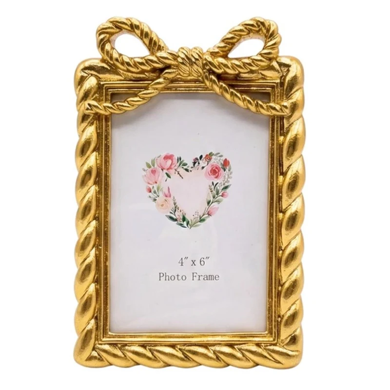 GOLD RESIN PHOTO FRAME WITH TWISTED ROPE AND BOW 10X15CM
