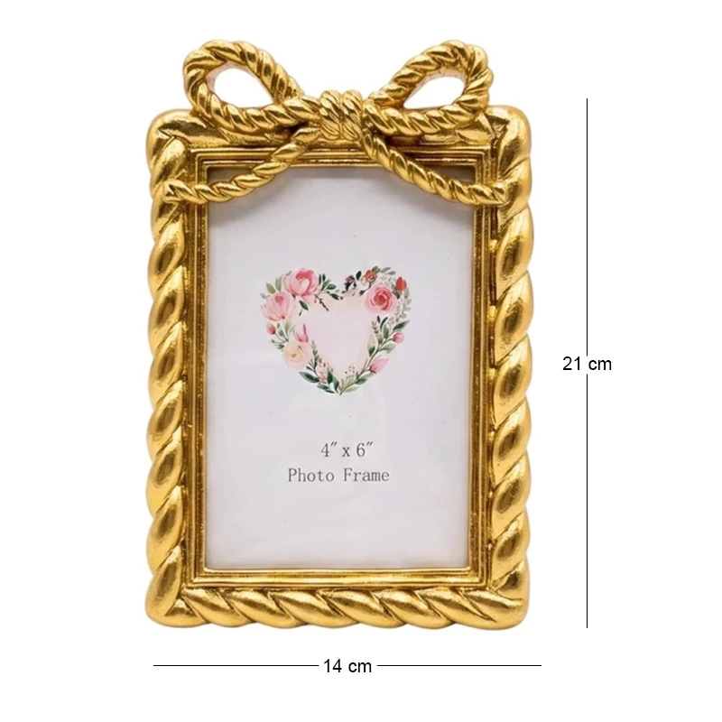 GOLD RESIN PHOTO FRAME WITH TWISTED ROPE AND BOW 10X15CM