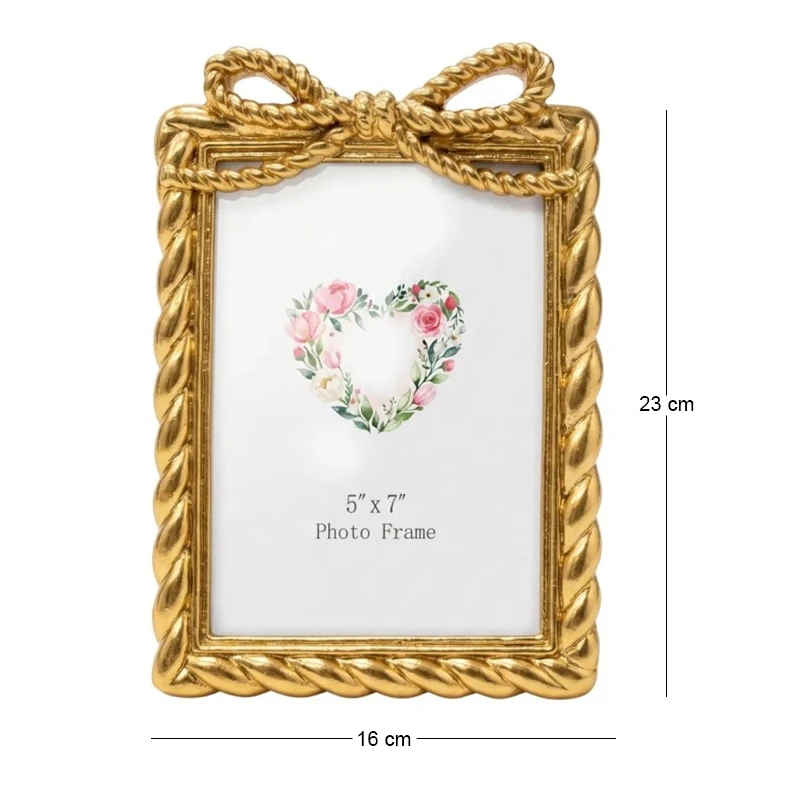 GOLD RESIN PHOTO FRAME WITH TWISTED ROPE AND BOW 13X18CM