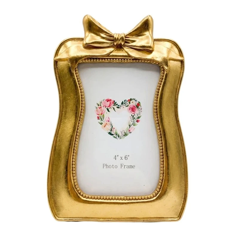 GOLD RESIN BOW PHOTO FRAME 10X15CM